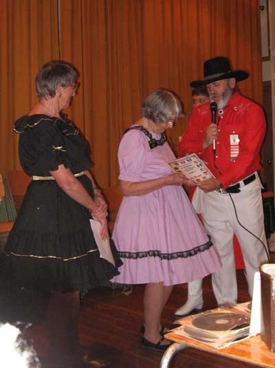 Lilian Wilson Receiving Long Service Award from ASRDF president Wayne Stretch